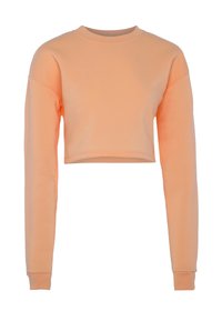 Persikofärgad kortärmad sweatshirt med långa ärmar samt ribbade manschetter och krage, visad mot en vit bakgrund.