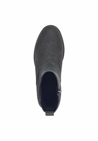 Bottine en cuir noir avec une texture lisse, dotée d'une fermeture éclair latérale et d'un petit talon, conçue pour unEnfilement facile.