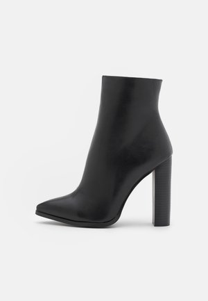 Bottines à talons hauts - black