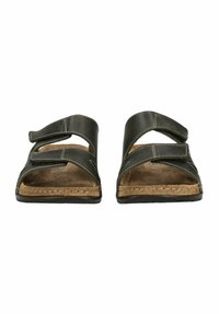 Černé kožené sandály s dvěma nastavitelnými popruhy na suchý zip, korkovou stélkou a plochou podrážkou. Prošití na popruzích a podrážce.