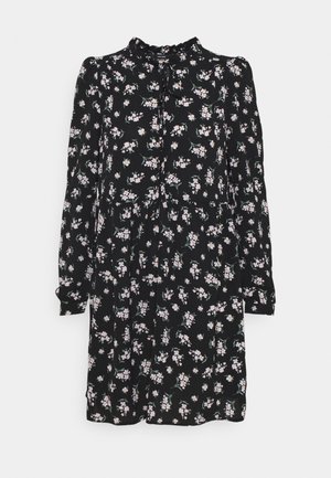 Zwarte jurk met lange mouwen met een klein wit en roze bloemmotief, een hoge ruches halslijn en een taille-naad detail.