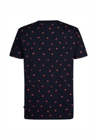 Laulupaita navy sininen, valmistettu puuvillasta, jossa on toistuva pieni punainen graafinen kuvio. Lyhyet hihat, pyöreä kaula-aukko, normaali istuvuus.