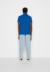 Tommy Hilfiger REGULAR - Polo - greek isle blue