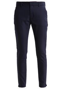 Marinblå slim-fit byxor tillverkade av ett slätt, lätt material med framfickor, bälteshällor och dragkedja.