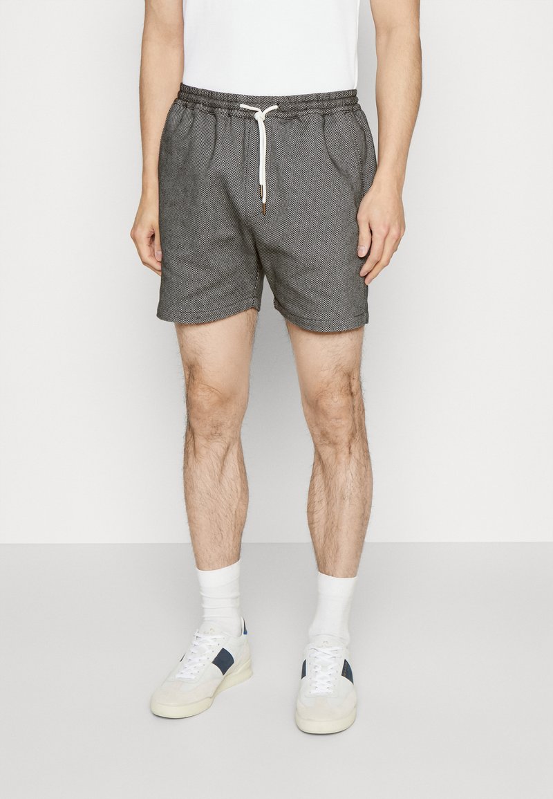 Rotholz EVERYDAY UNISEX Tracksuit bottoms black Zalando.ie