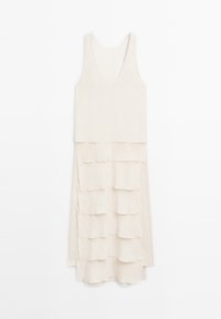 Ärmelloses, knielanges Kleid aus cremefarbener Stoff mit einem gestuften Rüschendesign und rohen Kanten für mehr Textur. Sanfte, fließende Silhouette.