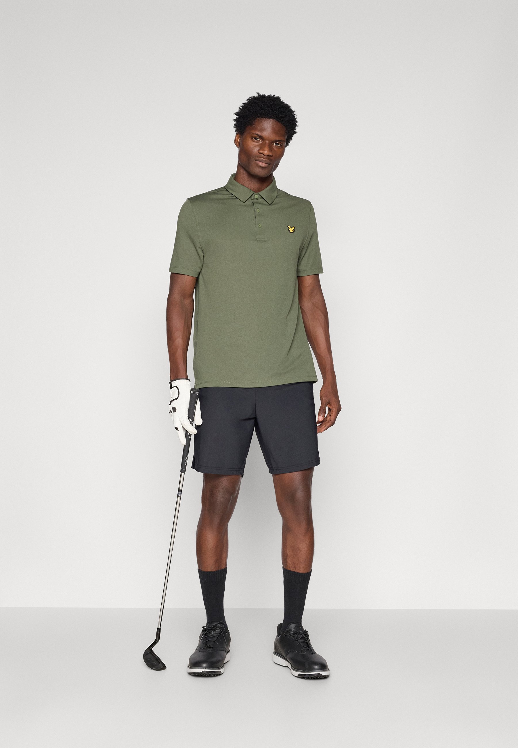 dark green golf shirts