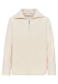 Pull-over en polaire de couleur crème avec manches longues, demi-fermeture éclair à l'avant et col montant, fabriqué en tissu doux et texturé.