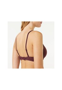 Bra in dark burgundy fabric, featuring a lace back design, adjustable straps, and a hook-and-eye closure. Smooth cups provide seamless coverage.