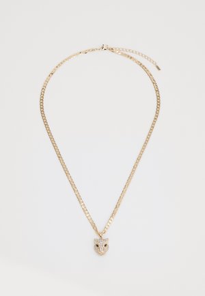 Auksinė grandinėlė su leopardo galvos pakabuku, puoštu skaidriais rhinestone akmenimis ir juodais akcentais, turinti lygų, blizgų paviršių.