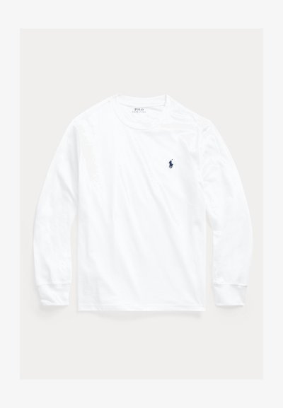 T-shirt blanc à manches longues avec col rond et petit logo Polo Ralph Lauren bleu marine brodé sur la poitrine gauche.