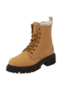 Tan veterschoenen voor de winter met een dikke zwarte zool en een witte fleece voering, ontworpen voor warmte en gebruik buitenshuis.