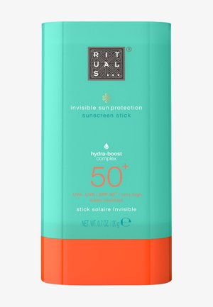 Stick solaire turquoise et orange étiqueté Rituals Invisible Sun Protection, SPF 50+, complexe hydra-boost, très haute protection, résistant à l'eau.