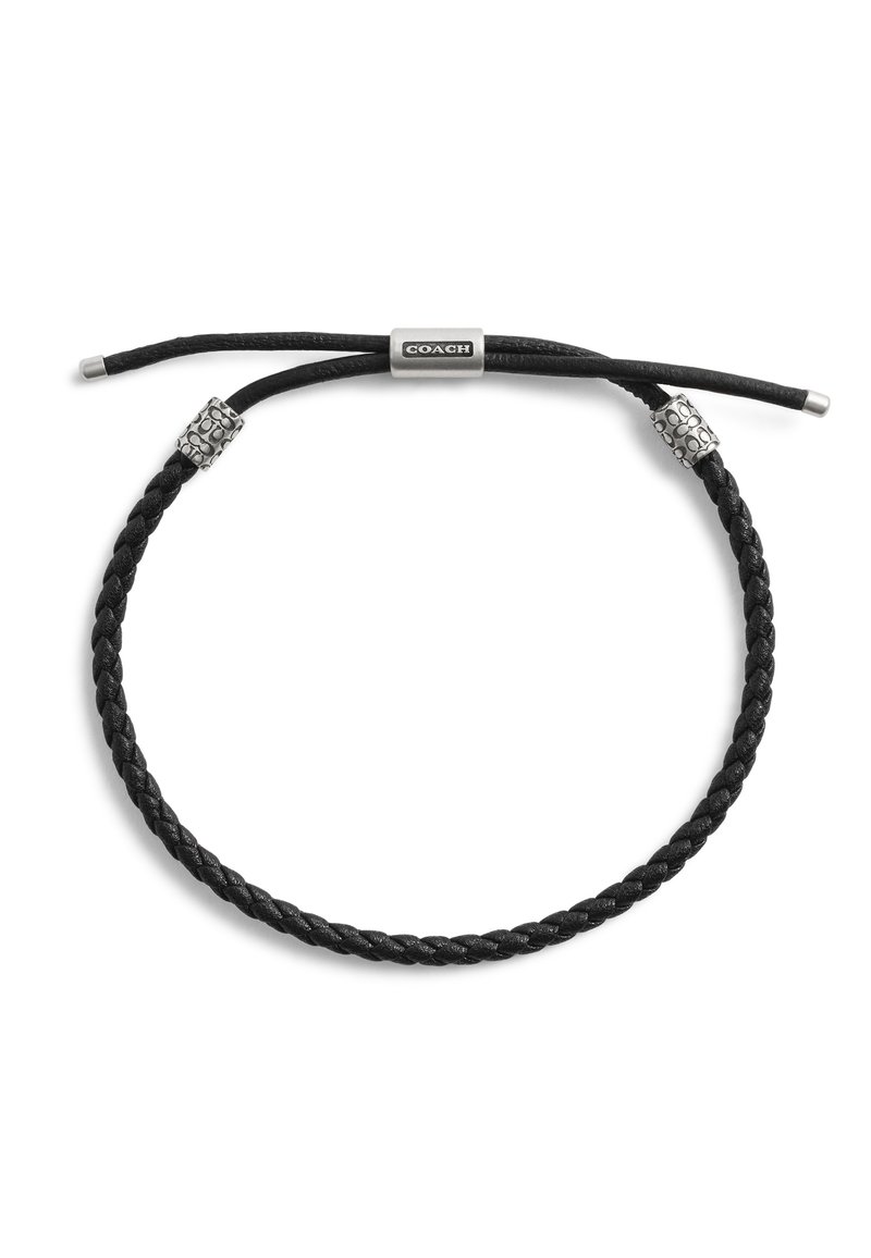 Bracelet en cuir tressé noir avec une fermeture cordon réglable. Accents en tube et perles en finition argentée. Design minimaliste.