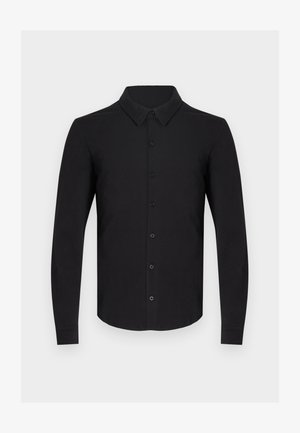Sort langærmet skjorte lavet af blødt stof med knaplukning foran, klassisk krave og knappede manchetter. Glat tekstur uden mønstre.