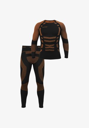 Schwarzes Thermo-Langarmshirt und Leggings mit orangefarbenen Akzentmustern. Verfügt über ein eng anliegendes Design und atmungsaktives, dehnbares Material.