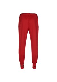 Rode jogger broek gemaakt van zachte stof, met een elastische tailleband en geribbelde boorden, voorzien van zwarte accentstrepen bij de enkels.