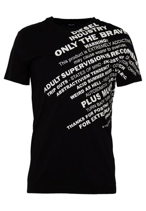Black cotton t-shirt featuring bold white text in various fonts and orientations, including brand name and warnings. Short sleeves, round neck.