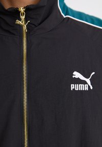 Puma T7  PLAY.LOUD. TRACK - Tréning dzseki - puma black