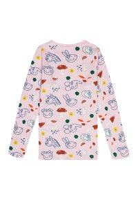 Chemise à manches longues rose clair avec différents visages et formes d'animaux de dessin animé en bleu, rouge, vert et jaune. Tissu en coton doux.