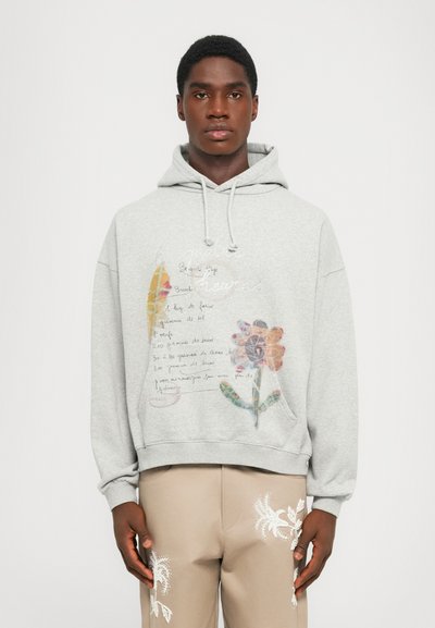 Grey hoodie made of cotton, featuring a floral graphic print and handwritten text. The design includes a drawstring hood and a kangaroo pocket.