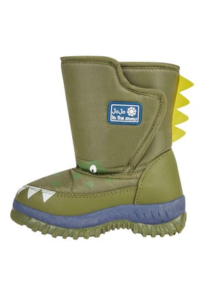 Grüner wasserdichter Stiefel mit runder Form, ausgestattet mit einer blauen Sohle, weißen Zähnen und Augendetails sowie gelben Stacheln entlang der Rückseite.