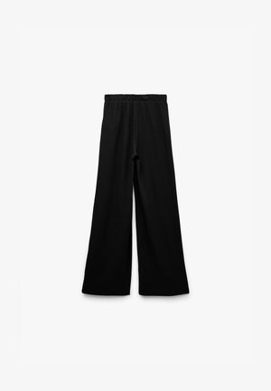 Zwarte wijde broek van een textuurstof, met een elastische tailleband en zonder zichtbare patronen of hardware-details.