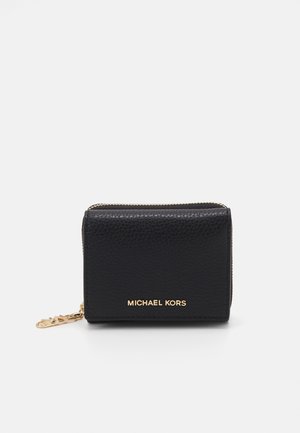 Black leather wallet with textured surface, gold zipper, and logo detailing on the front. Compact rectangular shape with a keychain attachment.