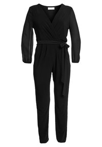 Svart byxdress med långa genomskinliga ärmar, omslag framtill och ett tygbälte. Har en skräddarsydd design och rak benpassform.