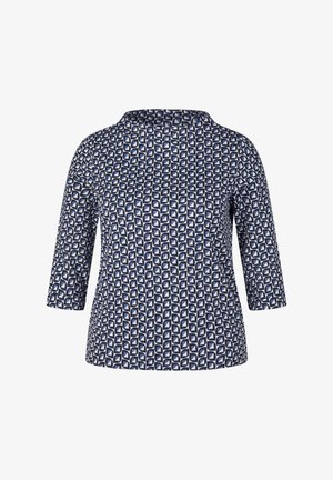 Navy blue top featuring a geometric pattern in light blue and white, with three-quarter sleeves and a rounded neckline.