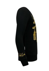 Zwarte sweatshirt met gouden borduursels en ingewikkelde ontwerpen. Geribde manchetten en onderrand, zijlogo-detail, gladde textuur, getailleerde snit.