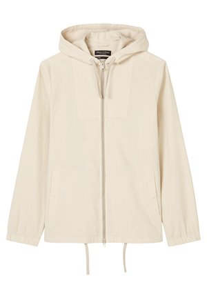 Beige hættejakke med lynlås foran, to sidelommer, elastiske ærmekanter og justerbare snore ved kanten.