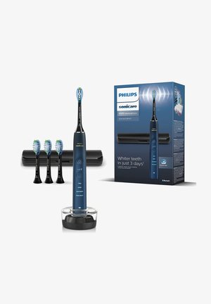 Philips Sonicare DiamondClean 9000: elektrische tandenborstel in donkerblauw, ronde basis, vier verwisselbare opzetborstels en een elegante oplaadcase.