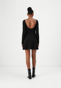 Tommy Jeans ESSENTIAL DRESS - Vestito di maglina - black