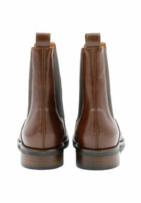 Bruin leren chelsea-boots met elastische zijpanelen en trekflappen, met een gladde afwerking en houten hak.