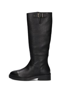 Black knee-high leather boot with low heel and adjustable strap buckle at the top, featuring textured grain finish and rounded toe.