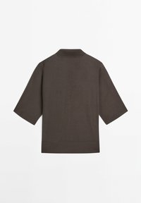 Brown short-sleeve top with a collar, made of lightweight fabric, featuring a straight cut and a clean silhouette. Smooth texture with minimal detailing.