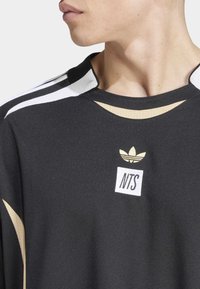 adidas Originals ADIDAS NTS RADIO - Sports T-shirt - black