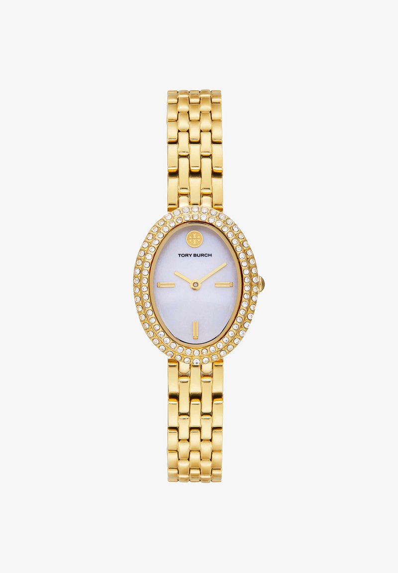 Goudkleurig Tory Burch polshorloge met ovale parelmoeren wijzerplaat, met kristallen bezette lunette, minimalistische gouden wijzers en schakelarmband.