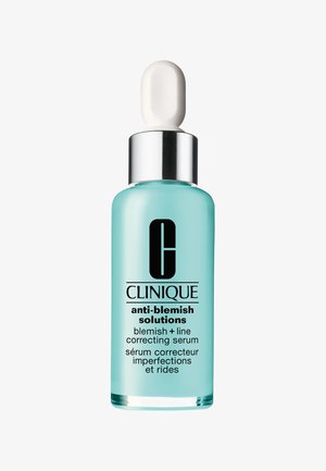 Clinique anti-blemish solutions serum i en klar glasflaske med en turkise væske, sølvhætte og hvid pipette. Tekst på flasken er synlig.