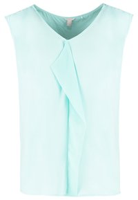 Blusa senza maniche di un azzurro chiaro con scollatura a V e dettaglio drappeggiato sul davanti. Realizzata in tessuto morbido con una vestibilità comoda e senza hardware visibile.