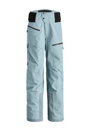 Light blue snow pants with a high waist, black elastic waistband, multiple zippered pockets, reinforced lower legs, and textured panel accents.