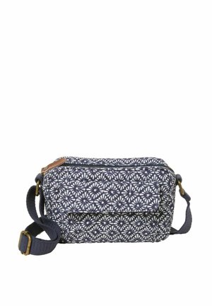 Navy fabric bag with white floral pattern, rectangular shape, top zipper closure, adjustable strap, and brown leather accent on zipper.