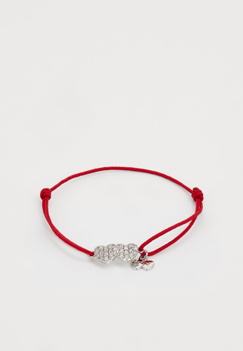 Red cord bracelet featuring a silver heart-shaped charm adorned with multiple clear rhinestones and a small heart pendant.