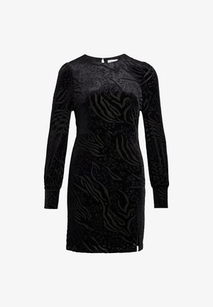 Vestido negro de terciopelo con mangas largas abullonadas. Presenta un diseño texturizado de estampado animal y un cierre en la parte posterior. Largo hasta las rodillas con una abertura lateral.