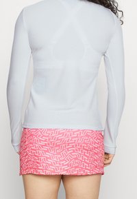 J.LINDEBERG Sports Top s dlouhým rukávem - white