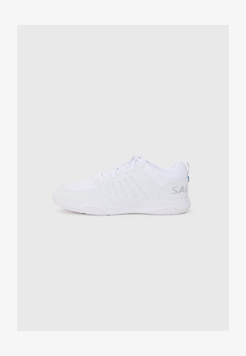 White athletic shoes featuring a textured upper, laces, and a solid rubber sole. Notable branding on the side and heel in gray.