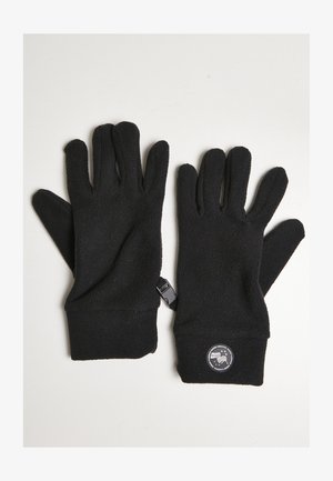 Zwarte fleece handschoenen met een gladde textuur, met een snug fit, vier vingers en een ronde logopatch op de pols.