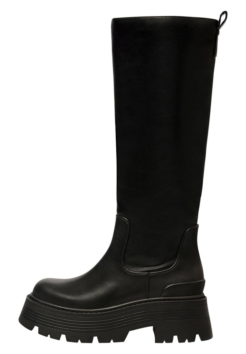 Black knee-high boot made from faux leather, featuring a thick platform sole, rounded toe, and pull tab at the top for easy wear.