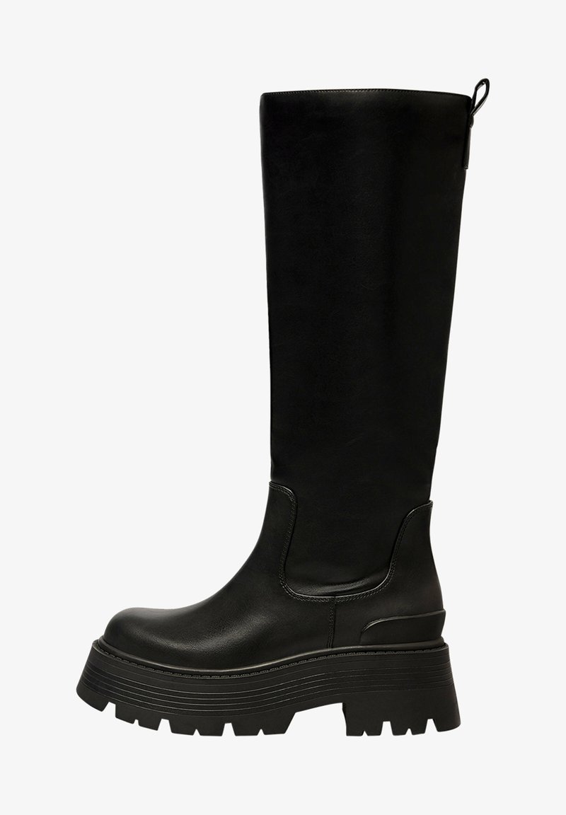 Black knee-high boot made from faux leather, featuring a thick platform sole, rounded toe, and pull tab at the top for easy wear.